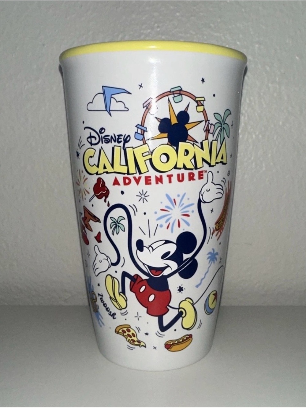 Starbucks White Ceramic Disney California Adventure Tumbler with Yellow Trim